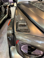 AUTHENTIC ROWEN CARBON BODY KIT for MERCEDES BENZ G CLASS AMG G63 W465 2024+

Set includes:

Front Lip

Front Bumper Air Vents Cover
Front Bumper Trims
Headlights Cover
Grille Cover
Turning Lights Cover
Hood Scoop
Roof Light
Roof Strip Trims
Door Window Frame
Side Mirrors Cover
Side Molding Trims
Door Panels
Fender Flares
Rear Spoiler
Rear Bumper Trims&nbsp;
Taillights Trims
Rear Diffuser

Material: Carbon Fiber