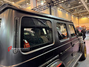 AUTHENTIC ROWEN CARBON BODY KIT for MERCEDES BENZ G CLASS AMG G63 W465 2024+

Set includes:

Front Lip

Front Bumper Air Vents Cover
Front Bumper Trims
Headlights Cover
Grille Cover
Turning Lights Cover
Hood Scoop
Roof Light
Roof Strip Trims
Door Window Frame
Side Mirrors Cover
Side Molding Trims
Door Panels
Fender Flares
Rear Spoiler
Rear Bumper Trims
Taillights Trims
Rear Diffuser

Material: Carbon Fiber