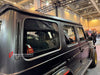AUTHENTIC ROWEN CARBON BODY KIT for MERCEDES BENZ G CLASS AMG G63 W465 2024+

Set includes:

Front Lip

Front Bumper Air Vents Cover
Front Bumper Trims
Headlights Cover
Grille Cover
Turning Lights Cover
Hood Scoop
Roof Light
Roof Strip Trims
Door Window Frame
Side Mirrors Cover
Side Molding Trims
Door Panels
Fender Flares
Rear Spoiler
Rear Bumper Trims
Taillights Trims
Rear Diffuser

Material: Carbon Fiber