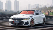 BODY KIT for BMW 3 SERIES G20 LCI 2022+

Set includes:
Front Lip
Hood Bonnet
Side Fender Vents
Side Skirts
Ducktail Spoiler
Rear Diffuser

Material: Plastic

NOTE: Professional installation is required.