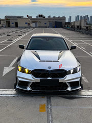 Body Kit for BMW 3 SERIES VII G20 G28 LCI 2023+
Set includes:

Front Lip
Front Bumper
Mirror Housing
Roof Spoiler
Spoiler
Material: Plastic (PP)

NOTE: Professional installation is required.