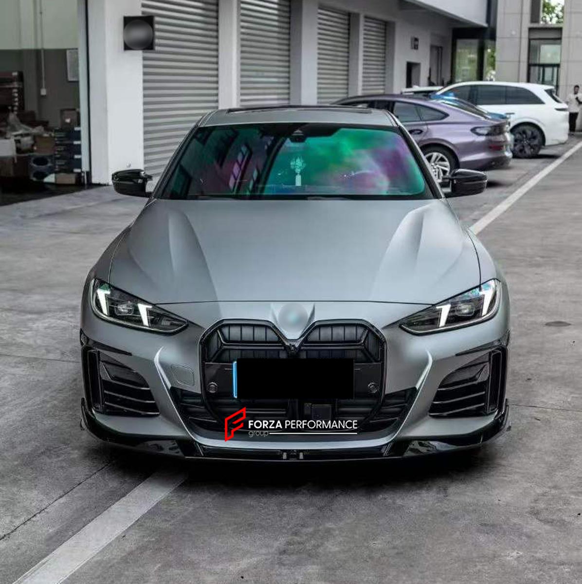 BODY KIT for BMW 4 SERIES GRAN COUPE G26 2021+ FORZA PERFORMANCE Custom fit Dry Carbon VTEN Design Style
Set includes:

Front Lip
Front Bumper Canards
Side Skirts
Rear Diffuser (dual/single outlet or quad outlet version — your choice)
Rear Lip
Rear Corners
Rear Spoiler
Roof Spoiler
Quad Titanium Black Exhaust Tips
Quad Carbon Fiber Exhaust Tips
Material: Plastic

NOTE: Professional installation is required.