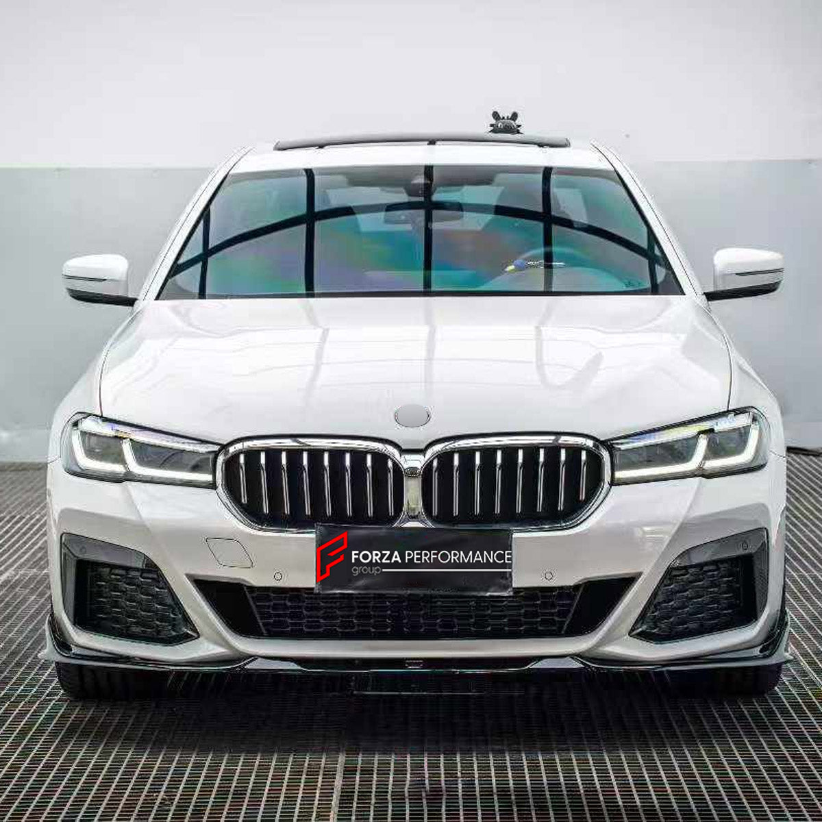 BODY KIT for BMW 5 SERIES G30 G38 LCI 2020 - 2024

Set includes:
Front Lip
Front Grille Mesh Cover Trims
Side Skirts
Rear Bumper Fins
Rear Diffuser

Material: Plastic

NOTE: Professional installation is required.
