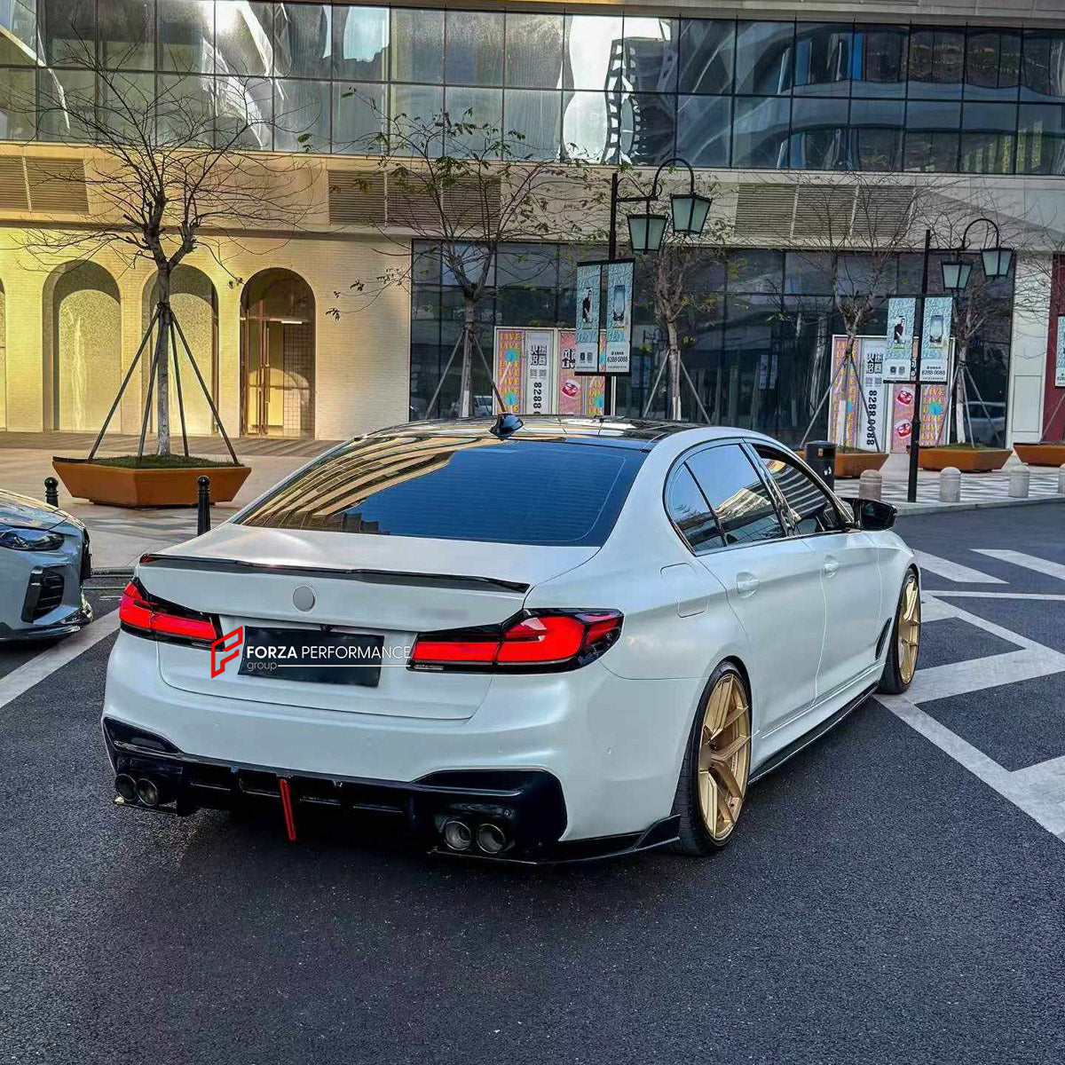 BODY KIT for BMW 5 SERIES G30 G38 LCI 2020 - 2024

Set includes:
Front Lip
Front Grille Mesh Cover Trims
Side Skirts
Rear Bumper Fins
Rear Diffuser

Material: Plastic

NOTE: Professional installation is required.