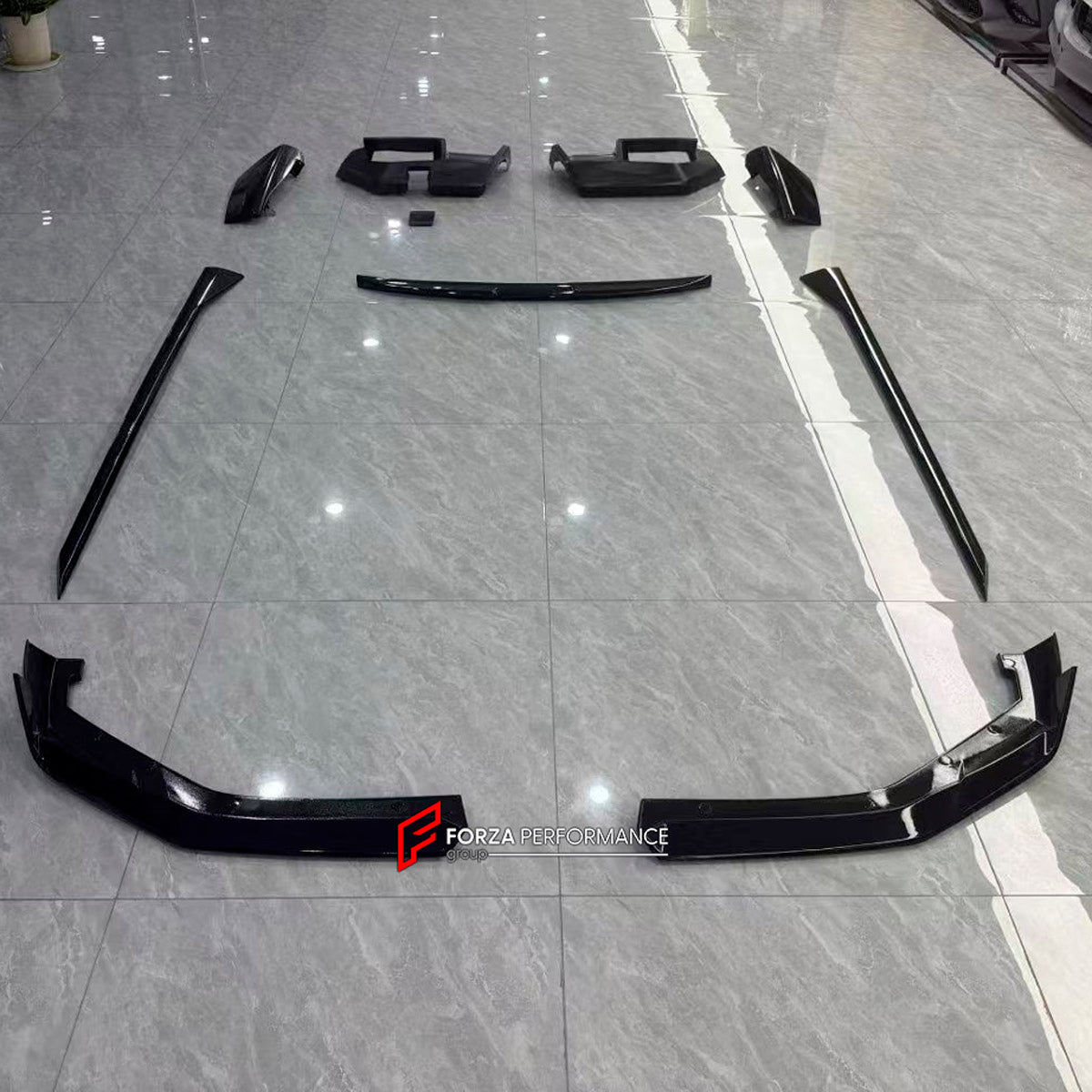 BODY KIT for BMW M5 G90 2024+ FORZA PERFORMANCE custom fit MP Competition

Set includes:
Front Lip
Side Skirts
Rear Spoiler
Rear Diffuser

Material: Plastic

NOTE: Professional installation is required.