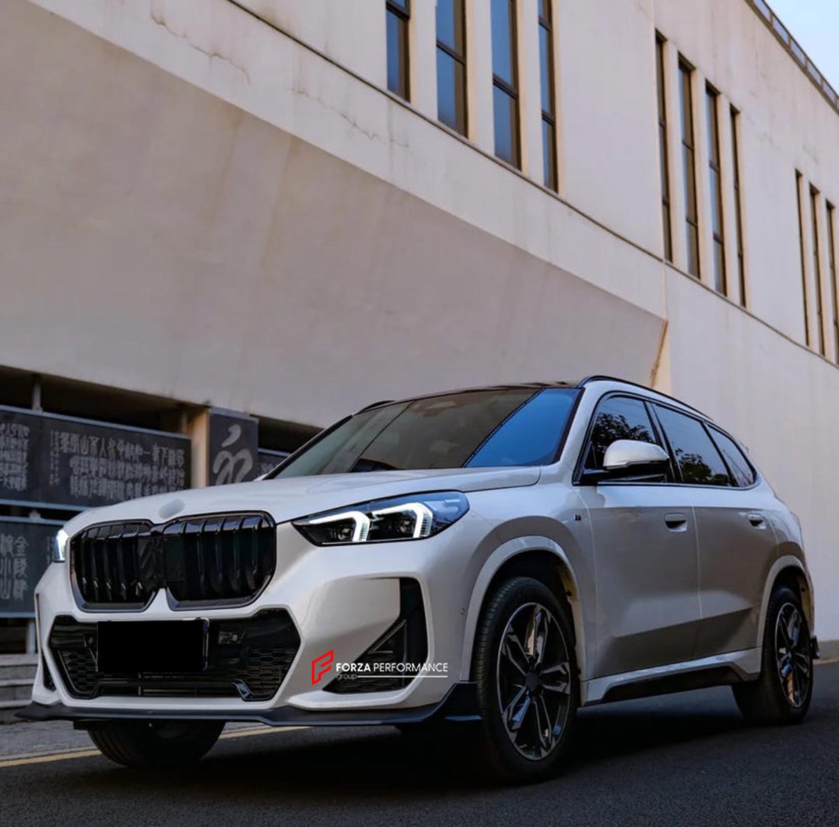 BODY KIT for BMW X1 U11 2022+ FORZA PERFORMANCE Custom fit Dry Carbon VTEN Design Style
Set includes:

Front Lip
Side Corners
Rear Diffuser
Rear Lip
Rear Corners
Roof Spoiler
Exhaust Tips
Material: Plastic

NOTE: Professional installation is required.
