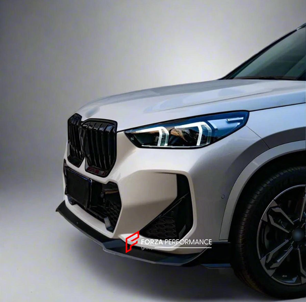 BODY KIT for BMW X1 U11 2022+ FORZA PERFORMANCE Custom fit Dry Carbon VTEN Design Style
Set includes:

Front Lip
Side Corners
Rear Diffuser
Rear Lip
Rear Corners
Roof Spoiler
Exhaust Tips
Material: Plastic

NOTE: Professional installation is required.