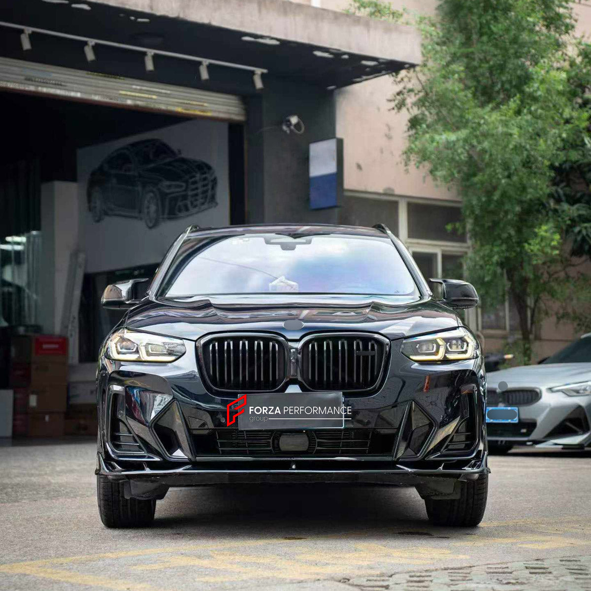 BODY KIT for BMW X3 G01 LCI M40I 2021 - 2024

Set includes:
Front Lip
Rear Bumper Fins
Rear Diffuser

Material: Plastic

NOTE: Professional installation is required.