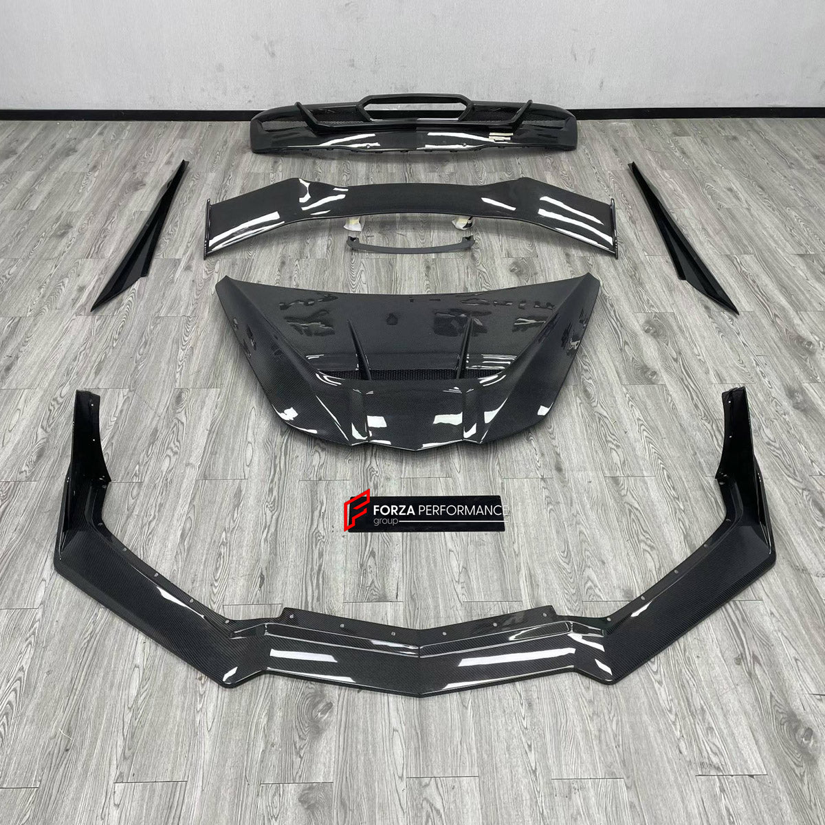 BODY KIT for CHEVROLET CORVETTE C8 2020+

Set includes:
Front Lip
Hood Bonnet
Side Skirts
Rear Spoiler Wing
Rear Diffuser

Material: Plastic

NOTE: Professional installation is required.
