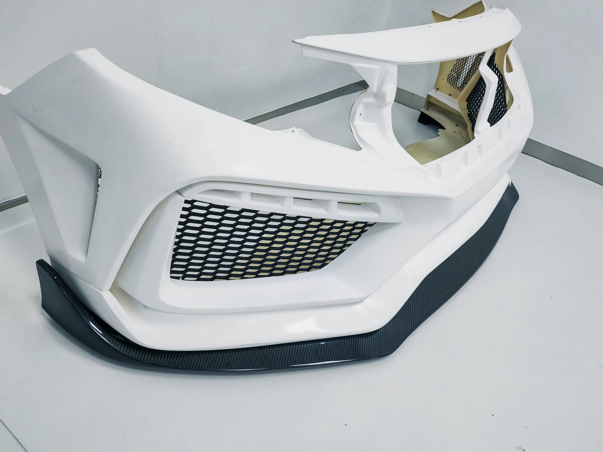 BODY KIT for HONDA CIVIC SEDAN HATCHBACK FC FK 2015 - 2022

Set includes:

Front Lip
Front Bumper Assembly

Hood / Bonnet

Side Skirts

Rear Wing Spoiler

Rear Bumper
Rear Diffuser

Material: Wet Carbon with Fiberglass

NOTE: Professional installation is required.&nbsp;

Why “Contact Us for Pricing”?

We don’t display fixed prices because our goal is to offer you the most competitive deal possible. Product costs often decrease over time, and by requesting a quote, you’ll receive our most up-to-date price on