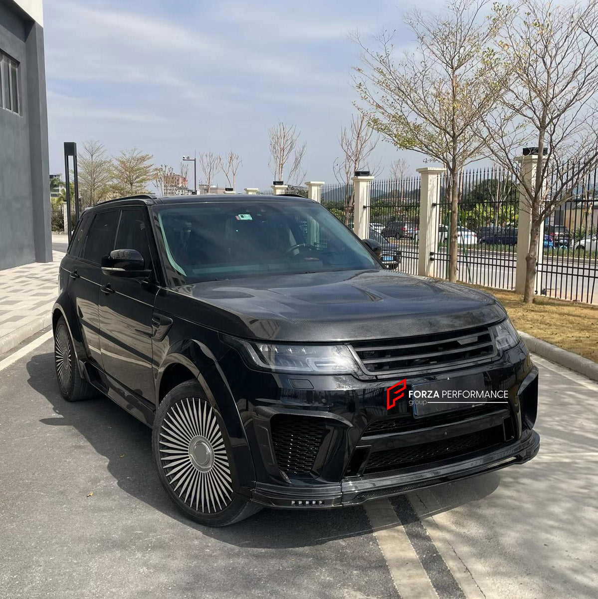 BODY KIT for LAND ROVER RANGE ROVER SPORT L494 2014 - 2022 FORZA PERFORMANCE custom fit SVR Style

Set includes:
Front Lip
Front Bumper Canards
Hood Bonnet
D-Pillar Covers
Roof Spoiler
Rear Bumper Fins
Rear Diffuser

Material: Plastic

NOTE: Professional installation is required.