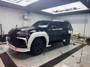 BODY KIT for LEXUS LX600 J300 2022+

Set includes:

Front Lip
Front Fender Flares
Rear Fender Flares
Rear Diffuser

Material: Plastic

Note: Professional installation is required.