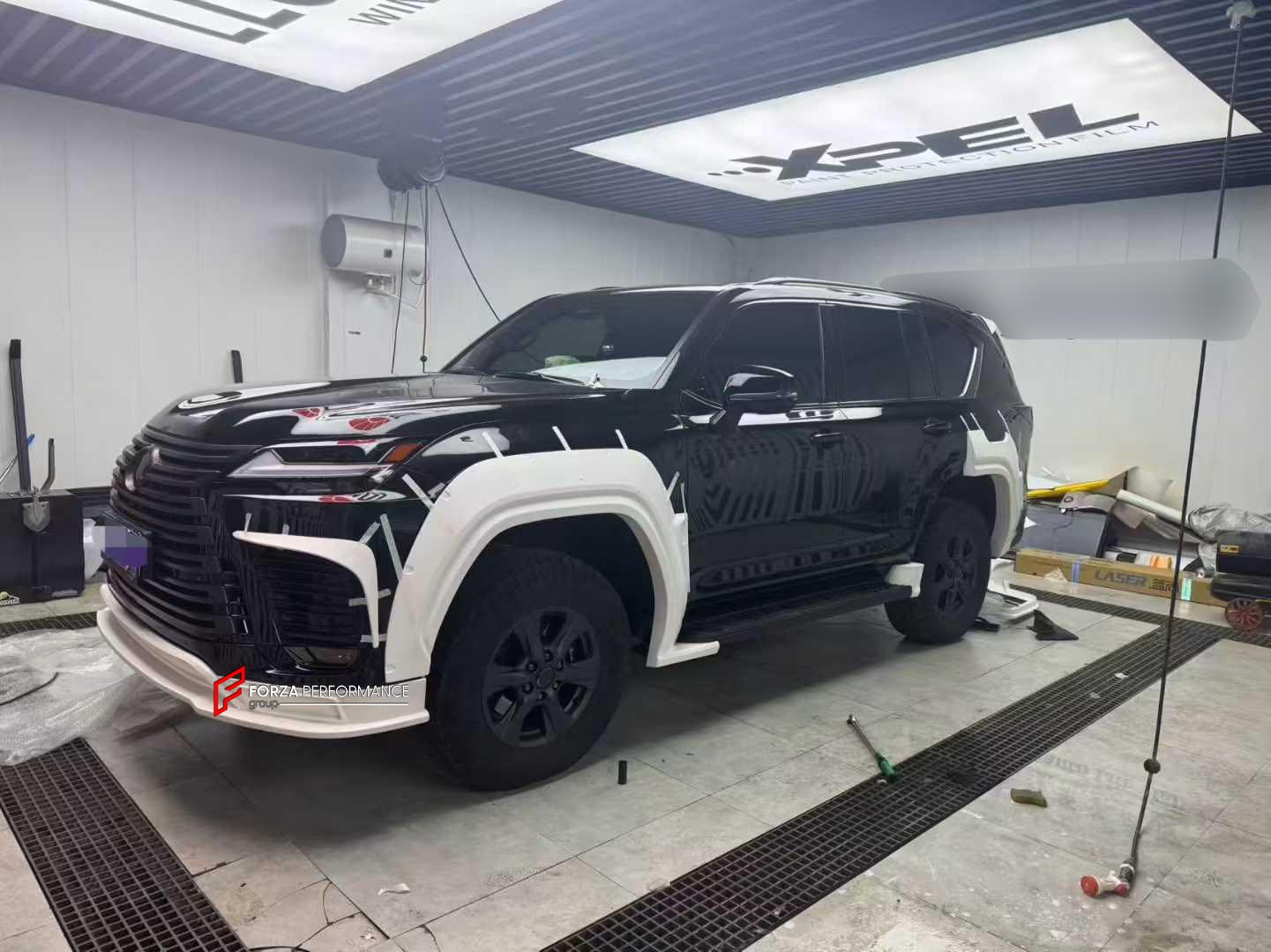 BODY KIT for LEXUS LX600 J300 2022+

Set includes:

Front Lip
Front Fender Flares
Rear Fender Flares
Rear Diffuser

Material: Plastic

Note: Professional installation is required.