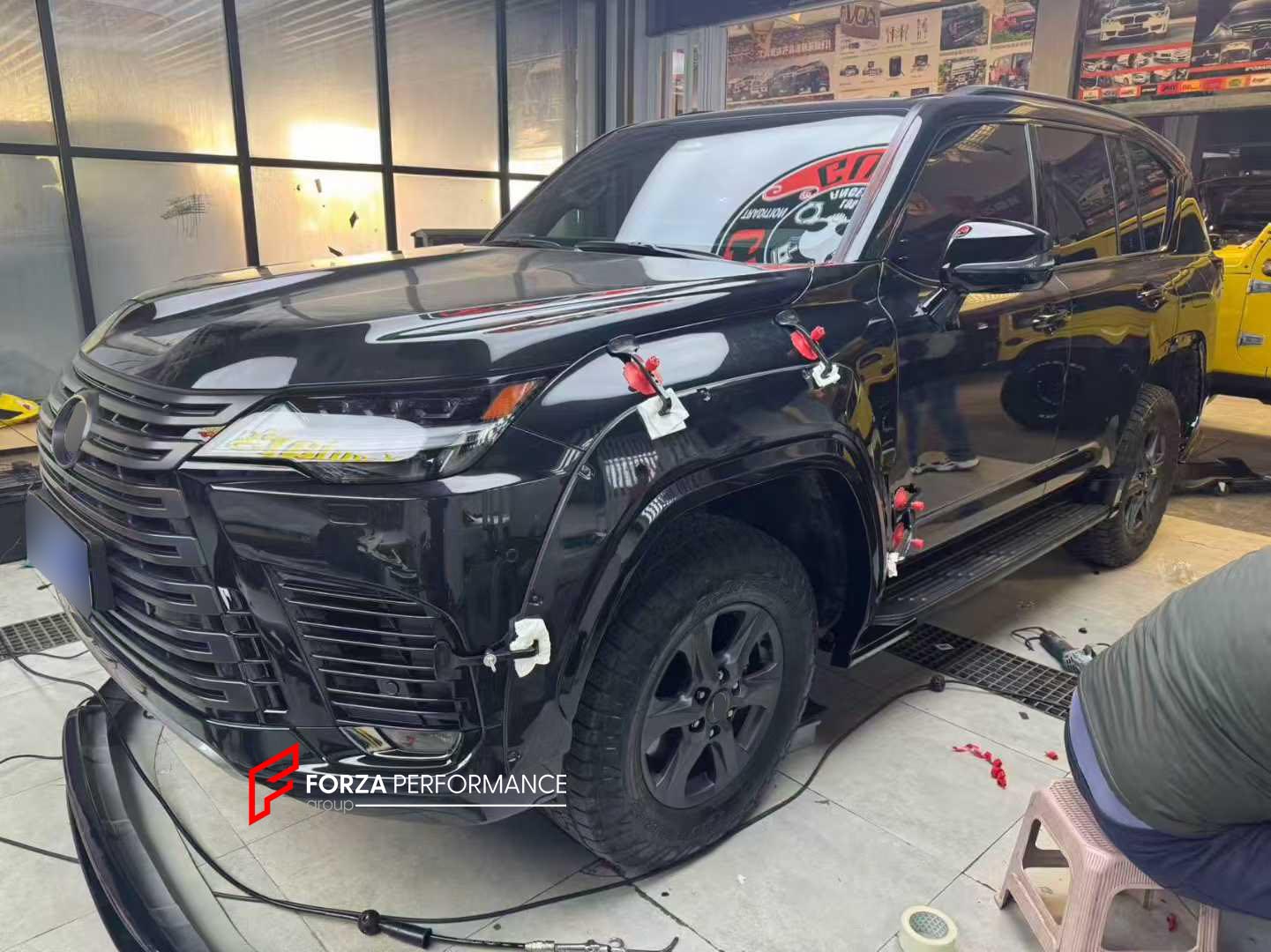 BODY KIT for LEXUS LX600 J300 2022+

Set includes:

Front Lip
Front Fender Flares
Rear Fender Flares
Rear Diffuser

Material: Plastic

Note: Professional installation is required.