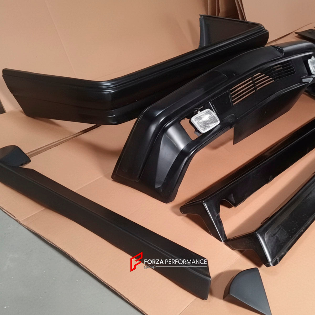 BODY KIT for Mercedes Benz E CLASS W124 1995+
Set includes:

Front Bumper
Front Fenders
Side Skirts
Side Moldings
Rear Fenders
Rear Bumper
Material: Plastic

NOTE: Professional installation is required.