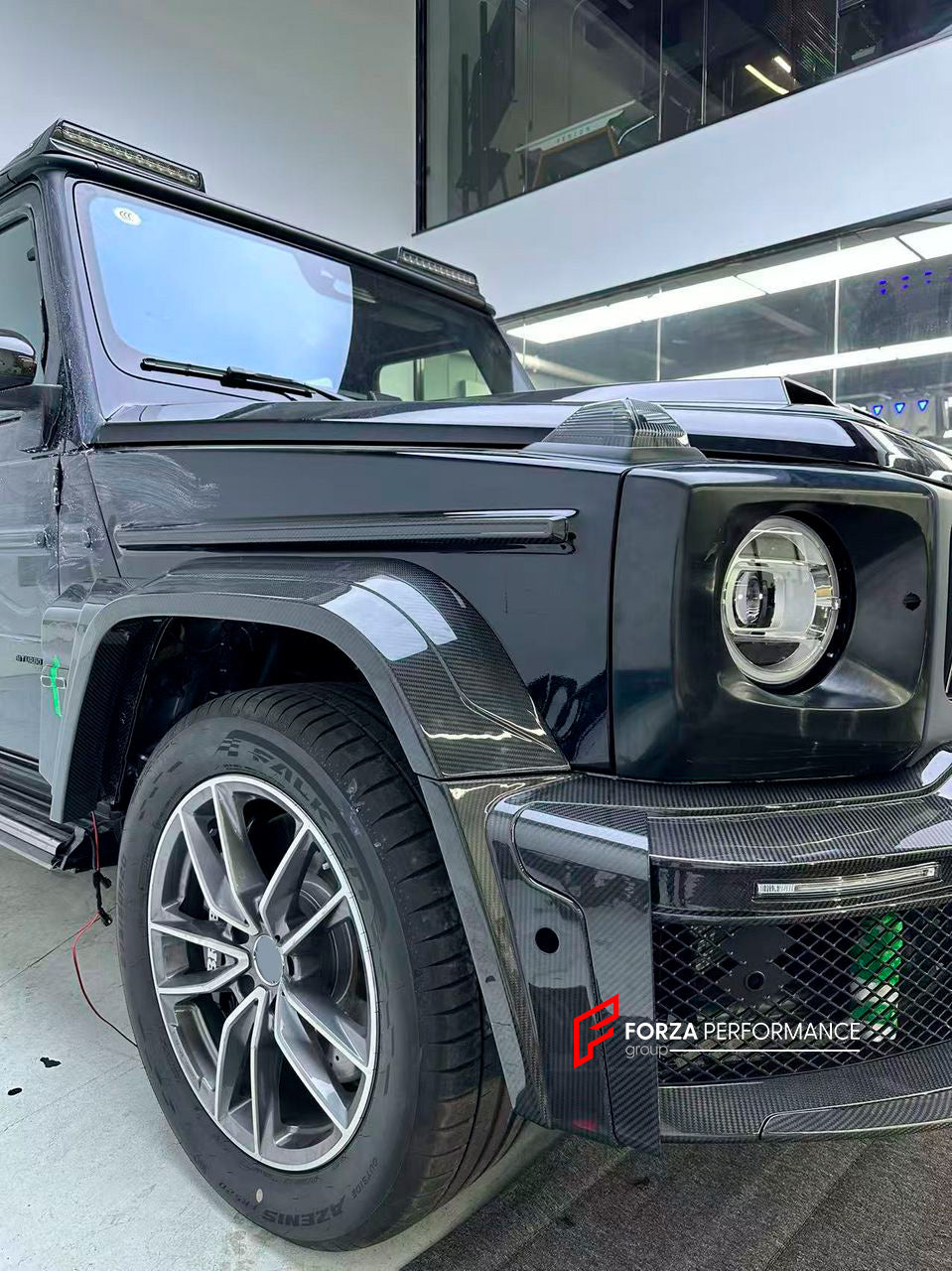 CARBON BODY KIT for MERCEDES-BENZ G-CLASS G63 W465 2024+

Set includes:

Front Bumper Assembly
Front Grille
Hood / Bonnet
Front Fenders
Rear Spoiler
Rear Fender Flares
Rear Bumper

Material: Carbon Fiber

NOTE: Professional installation is required.

Contact us for pricing