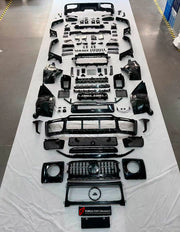 BODY KIT for Mercedes Benz G Class W465 G63 G500 2024+
Set includes:

Front Lip
Front Bumper Assembly
Front Grille
License Plate
Hood Bonnet
Front Fenders
Side Mirror Covers
Roof Light Bar
Rear Fenders
Roof Spoiler
Rear Diffuser
Rear Bumper Assembly
Material: Plastic

NOTE: Professional installation is required.