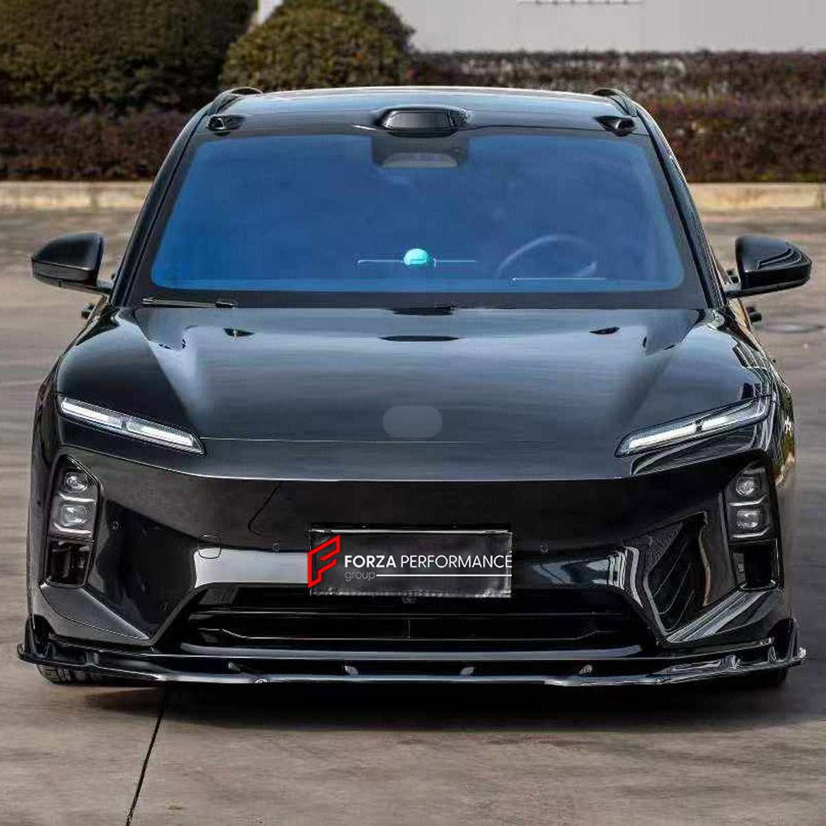 BODY KIT for NIO ET5T TOURING 2023+

Set includes:
Front Lip
Side Skirts
Rear Bumper Fins
Rear Diffuser

Material: Plastic

NOTE: Professional installation is required.