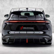 BODY KIT for NIO ET5T TOURING 2023+

Set includes:
Front Lip
Side Skirts
Rear Bumper Fins
Rear Diffuser

Material: Plastic

NOTE: Professional installation is required.