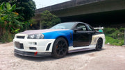 BODY KIT for Nissan R34
Set includes:

Front Hood Bonnet
Front Bumper
Front Spoiler Lip
Front Fender
Side Skirt
Side Under Spoiler
Rear Fender
Rear Bumper
Rear Under Apron
Rear Wing Spoiler
Rear Under Broad Diffuser
NOTE: Professional installation is required.