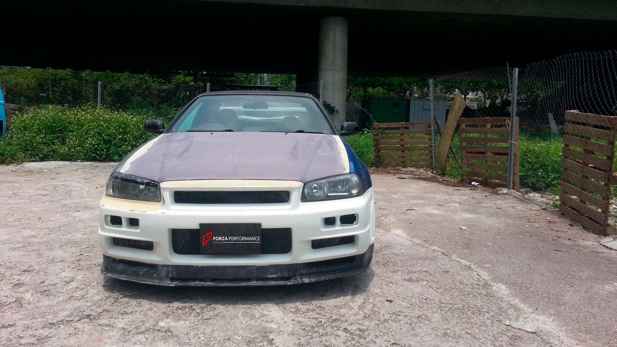 BODY KIT for Nissan R34
Set includes:

Front Hood Bonnet
Front Bumper
Front Spoiler Lip
Front Fender
Side Skirt
Side Under Spoiler
Rear Fender
Rear Bumper
Rear Under Apron
Rear Wing Spoiler
Rear Under Broad Diffuser
NOTE: Professional installation is required.