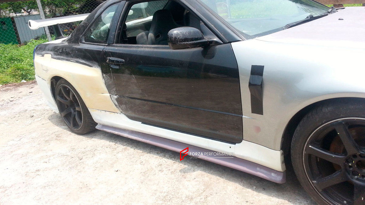 BODY KIT for Nissan R34
Set includes:

Front Hood Bonnet
Front Bumper
Front Spoiler Lip
Front Fender
Side Skirt
Side Under Spoiler
Rear Fender
Rear Bumper
Rear Under Apron
Rear Wing Spoiler
Rear Under Broad Diffuser
NOTE: Professional installation is required.