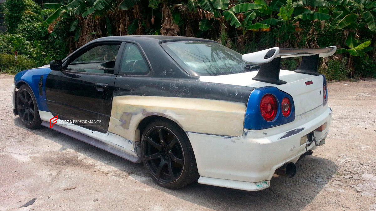 BODY KIT for Nissan R34
Set includes:

Front Hood Bonnet
Front Bumper
Front Spoiler Lip
Front Fender
Side Skirt
Side Under Spoiler
Rear Fender
Rear Bumper
Rear Under Apron
Rear Wing Spoiler
Rear Under Broad Diffuser
NOTE: Professional installation is required.