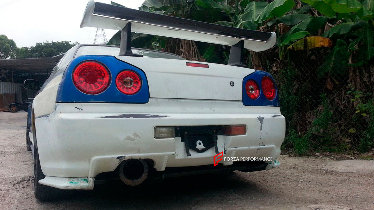 BODY KIT for Nissan R34
Set includes:

Front Hood Bonnet
Front Bumper
Front Spoiler Lip
Front Fender
Side Skirt
Side Under Spoiler
Rear Fender
Rear Bumper
Rear Under Apron
Rear Wing Spoiler
Rear Under Broad Diffuser
NOTE: Professional installation is required.