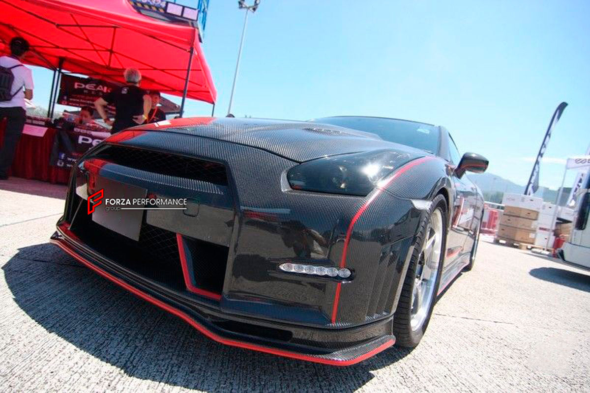 CARBON BODY KIT for Nissan R35 GT-R
Set includes:

Front Bumper
Front Splitter
Front Fender
Side Skirt
Rear Bumper
Rear Diffuser
High Stand Rear Wing Spoiler
Material: Carbon

NOTE: Professional installation is required.