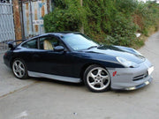Body Kit for Porsche 996 Carrera
Set includes:

Front Bumper
Rear Bumper
Side Skirts
NOTE: Professional installation is required.