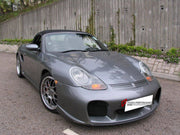 Body Kit for Porsche Boxster 986
Set includes:

Front Bumper
Rear Bumper
Side Skirts
NOTE: Professional installation is required.