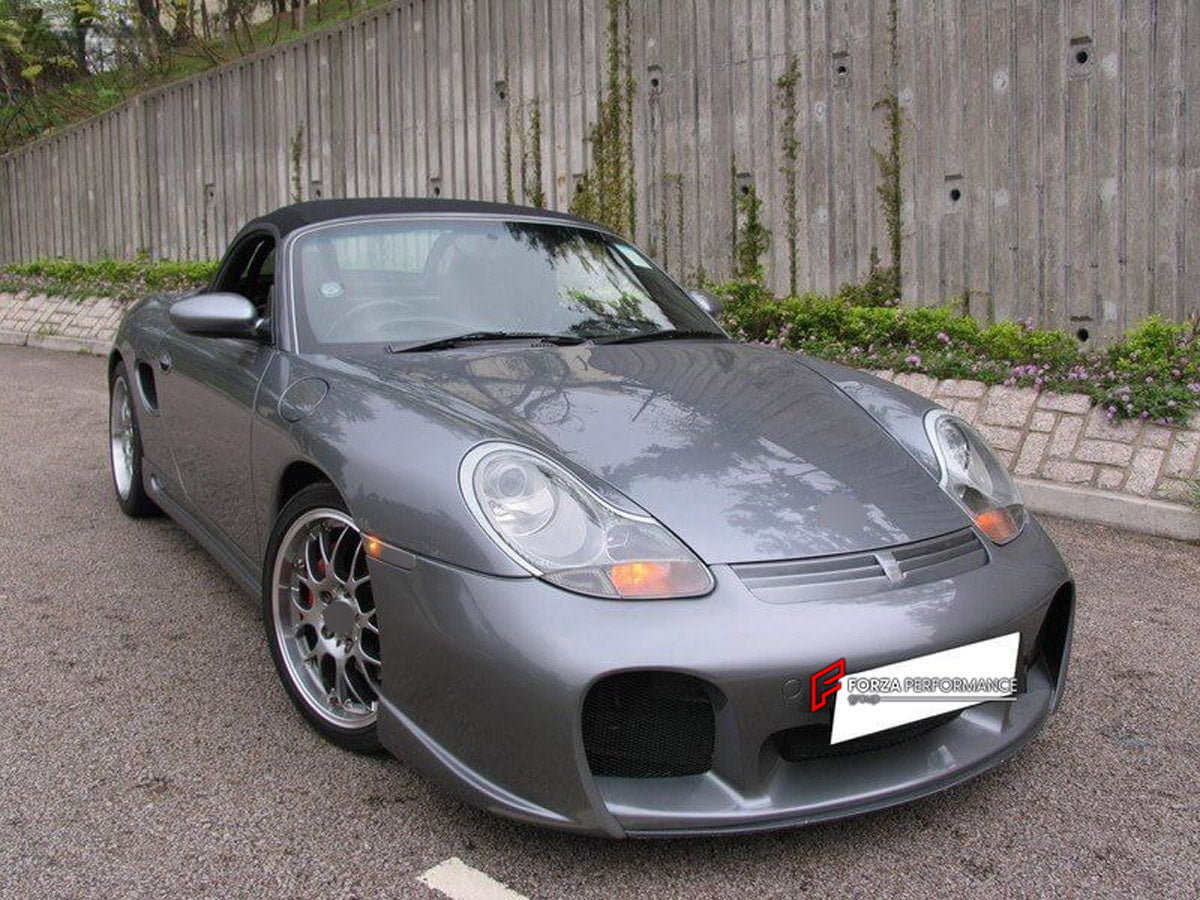 Body Kit for Porsche Boxster 986
Set includes:

Front Bumper
Rear Bumper
Side Skirts
NOTE: Professional installation is required.