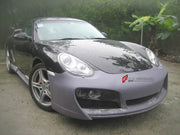 BODY KIT for Porsche Cayman 987 2009 - 2011
Set includes:

Front Bumper
Side Skirts
Rear Bumper
Rear Spoiler Wing
Material: Plastic

NOTE: Professional installation is required.

