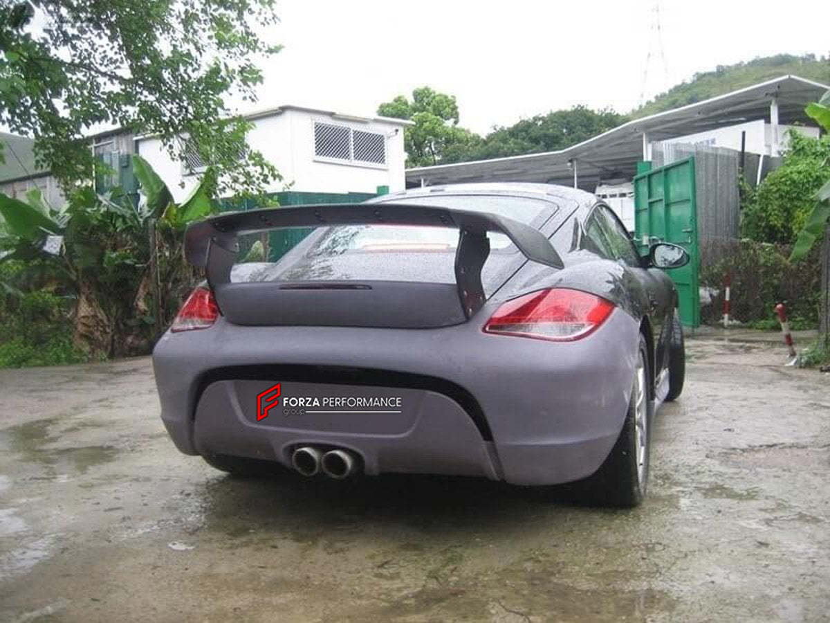 BODY KIT for Porsche Cayman 987 2009 - 2011
Set includes:

Front Bumper
Side Skirts
Rear Bumper
Rear Spoiler Wing
Material: Plastic

NOTE: Professional installation is required.

