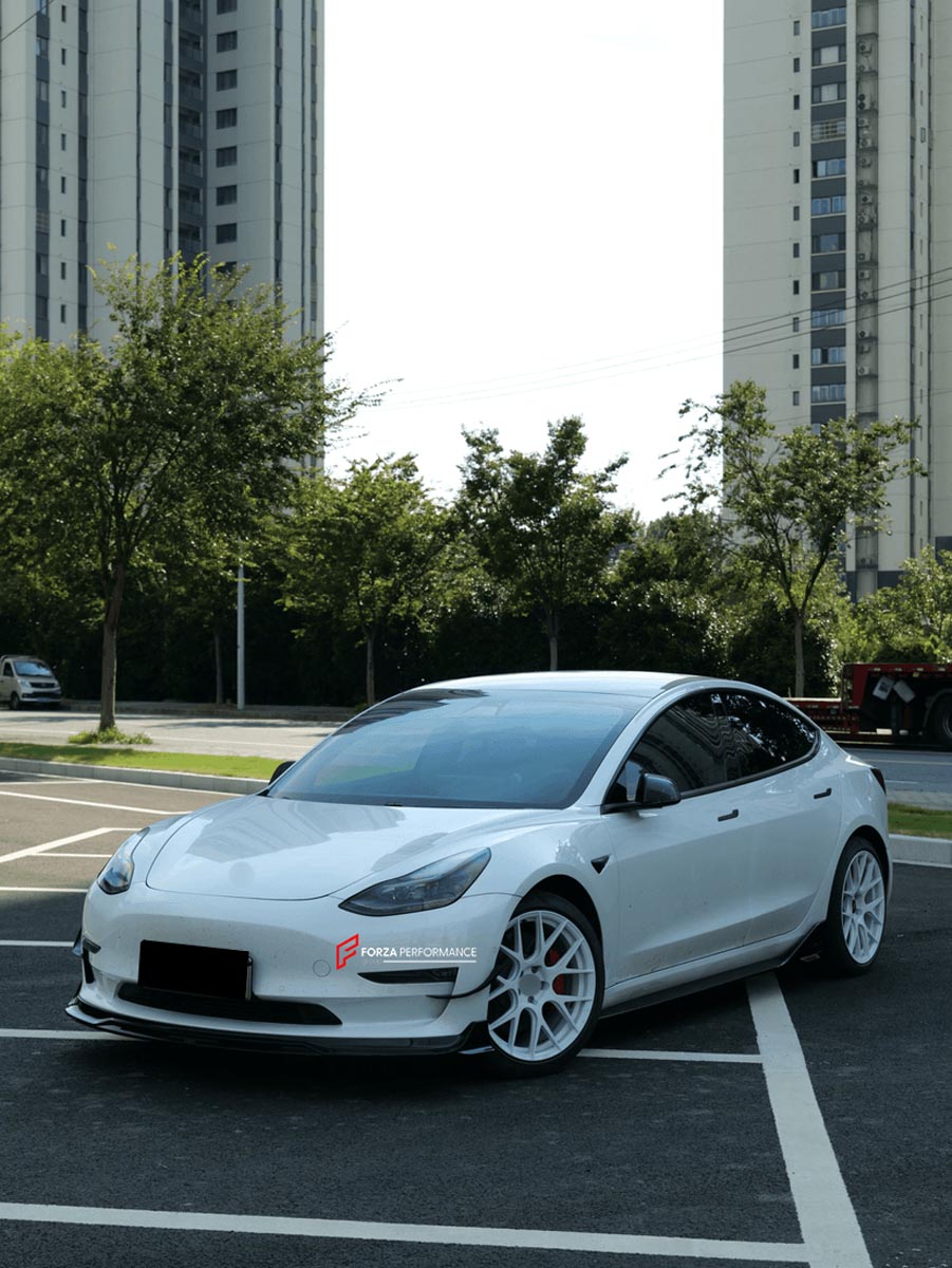 BODY KIT for TESLA MODEL 3 2017 - 2023 FORZA PERFORMANCE Custom fit Dry Carbon VTEN Design Style
Set includes:

One Piece Front Lip
Front Bumper Canards
Rear Lip
Rear Corners
Rear Spoiler
Material: Plastic

NOTE: Professional installation is required.