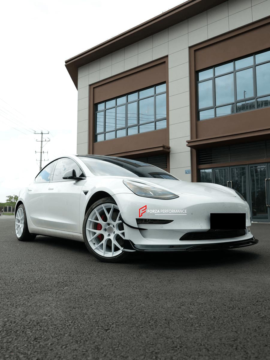 BODY KIT for TESLA MODEL 3 2017 - 2023 FORZA PERFORMANCE Custom fit Dry Carbon VTEN Design Style
Set includes:

One Piece Front Lip
Front Bumper Canards
Rear Lip
Rear Corners
Rear Spoiler
Material: Plastic

NOTE: Professional installation is required.