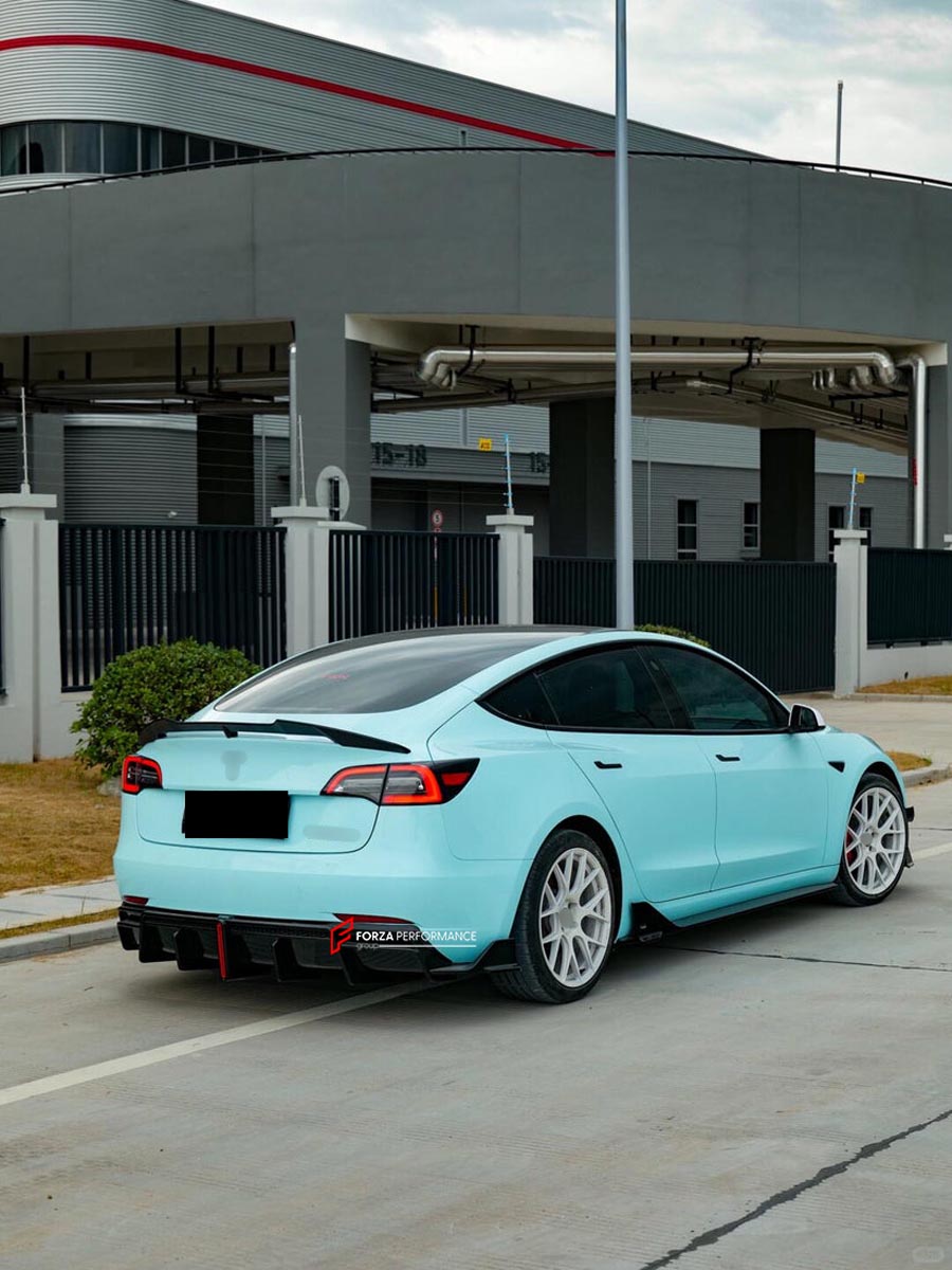BODY KIT for TESLA MODEL 3 2017 - 2023 FORZA PERFORMANCE Custom fit Dry Carbon VTEN Design Style
Set includes:

One Piece Front Lip
Front Bumper Canards
Rear Lip
Rear Corners
Rear Spoiler
Material: Plastic

NOTE: Professional installation is required.