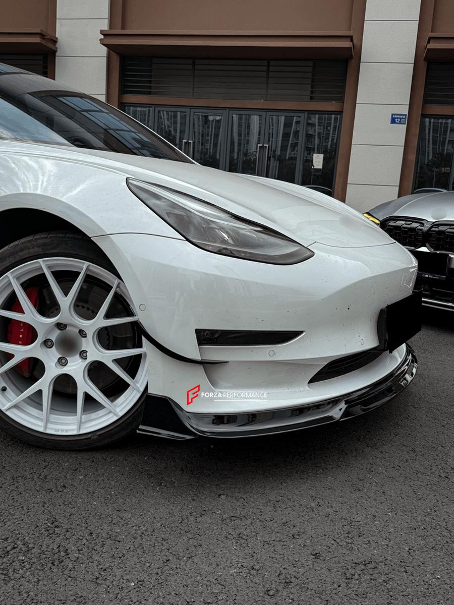 BODY KIT for TESLA MODEL 3 2017 - 2023 FORZA PERFORMANCE Custom fit Dry Carbon VTEN Design Style
Set includes:

One Piece Front Lip
Front Bumper Canards
Rear Lip
Rear Corners
Rear Spoiler
Material: Plastic

NOTE: Professional installation is required.