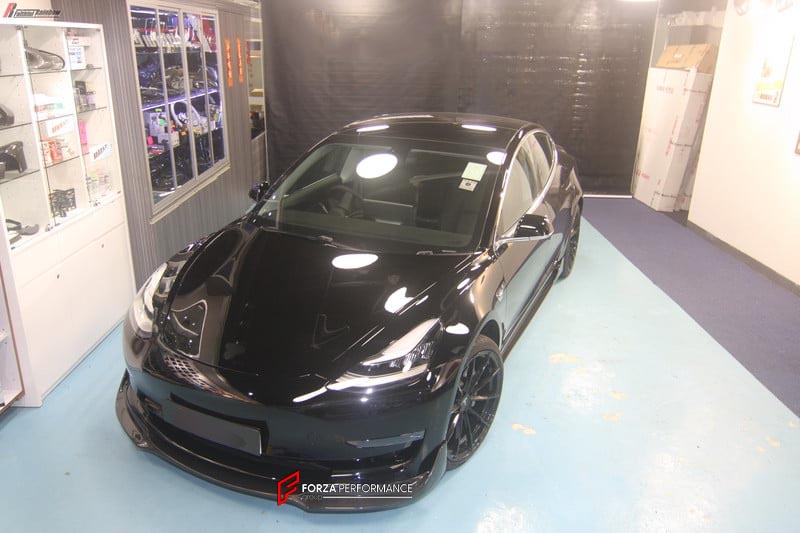 BODY KIT for TESLA MODEL 3 FR DESIGN CARBON FIBER

Set includes:
Front Splitter
Rear Diffuser
Side Skirt
Tail Spoiler

Material: Carbon

NOTE: Professional installation is required.