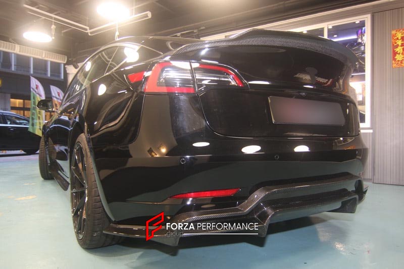 BODY KIT for TESLA MODEL 3 FR DESIGN CARBON FIBER

Set includes:
Front Splitter
Rear Diffuser
Side Skirt
Tail Spoiler

Material: Carbon

NOTE: Professional installation is required.