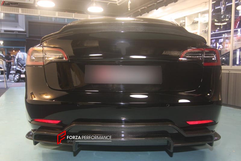 BODY KIT for TESLA MODEL 3 FR DESIGN CARBON FIBER

Set includes:
Front Splitter
Rear Diffuser
Side Skirt
Tail Spoiler

Material: Carbon

NOTE: Professional installation is required.