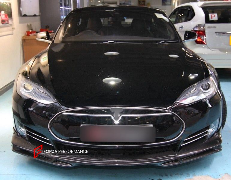 BODY KIT for TESLA MODEL S FR DESIGN CARBON FIBER

Set includes:
Front Spoiler Lip
Rear Spoiler Lip
Side Skirt
Tail Spoiler

Material: Carbon

NOTE: Professional installation is required.