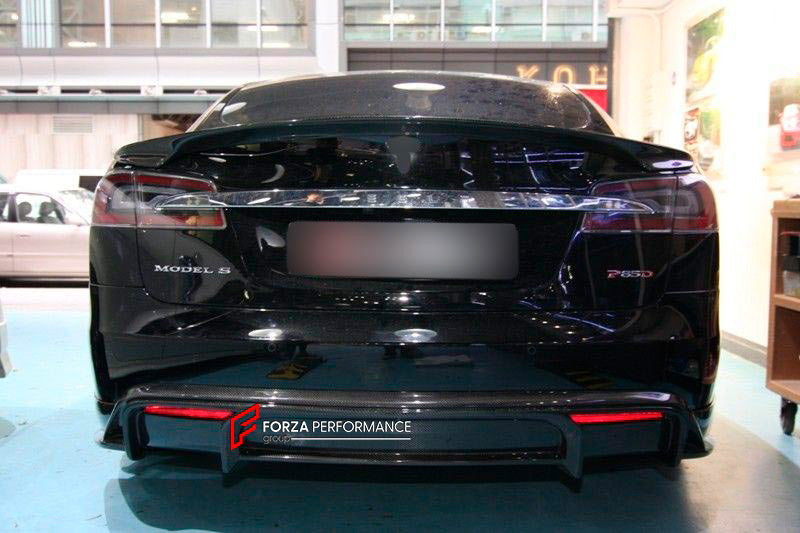 BODY KIT for TESLA MODEL S FR DESIGN CARBON FIBER

Set includes:
Front Spoiler Lip
Rear Spoiler Lip
Side Skirt
Tail Spoiler

Material: Carbon

NOTE: Professional installation is required.