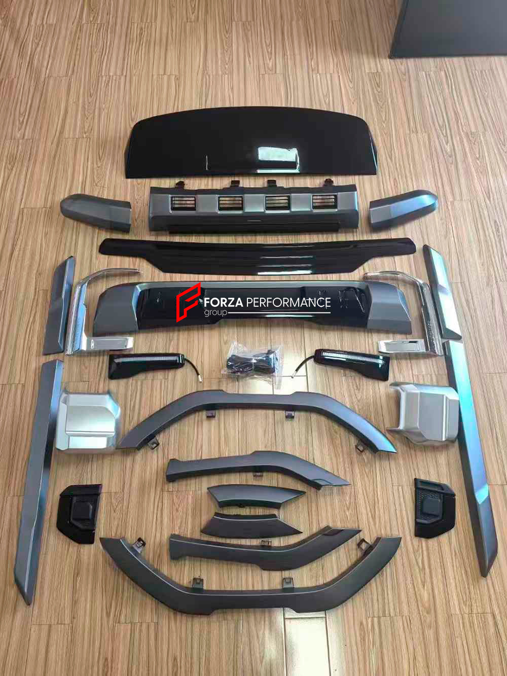 BODY KIT for TOYOTA LAND CRUISER 250 LC 250 2024

Set includes:

Front Bumper Fog Light Trims
Front Skid Plate
Side Fender Trims
Side Door Trims
Roof Spoiler
Rear Trunk Trim
Rear Bumper Step Guard

Material: Plastic

Note: Professional installation is required.
