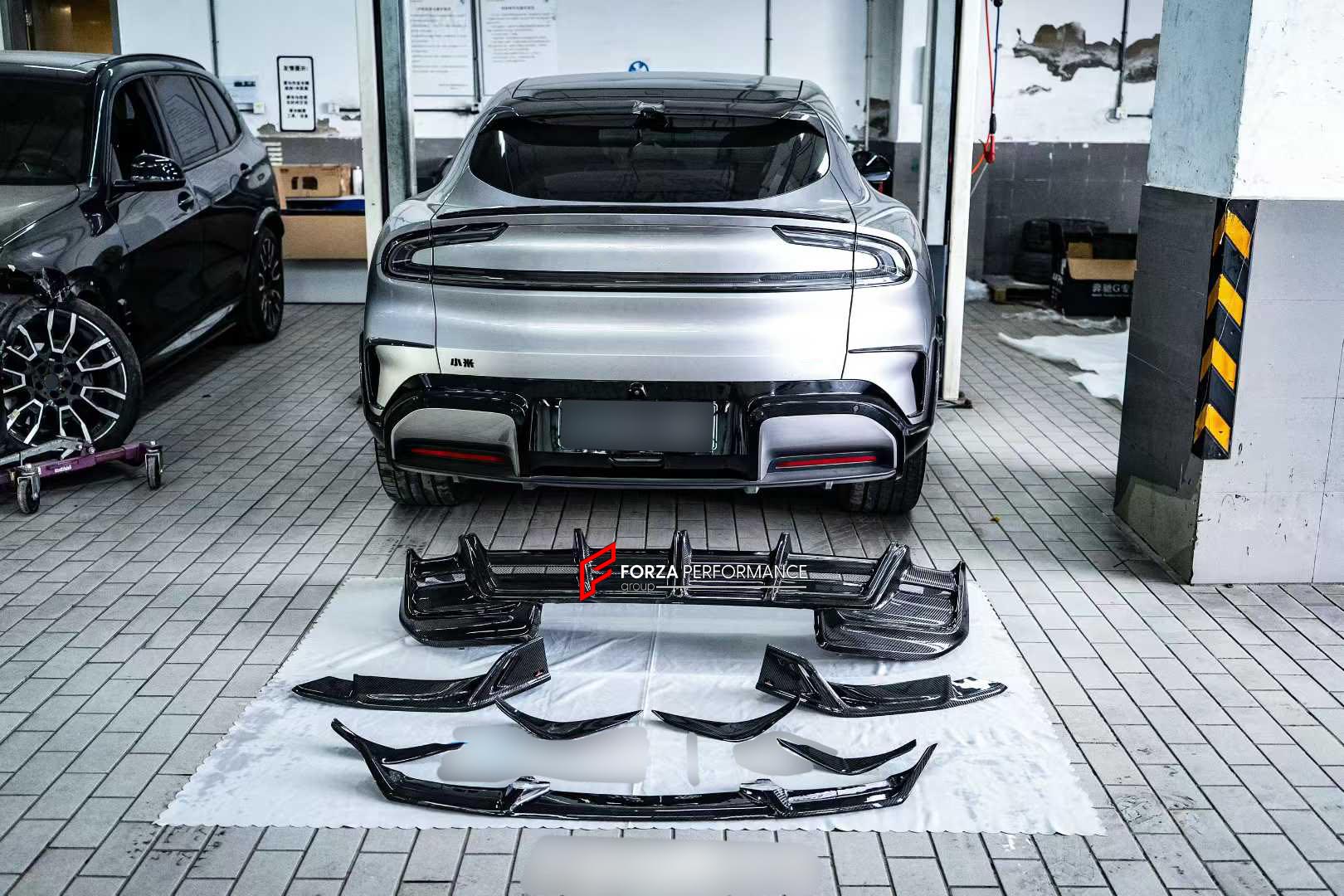 DRY CARBON BODY KIT for XIAOMI YU7 2025+

Set includes:
Front Lip
Front Bumper Canards
Rear Diffuser

Material: Dry Carbon

NOTE: Professional installation is required.