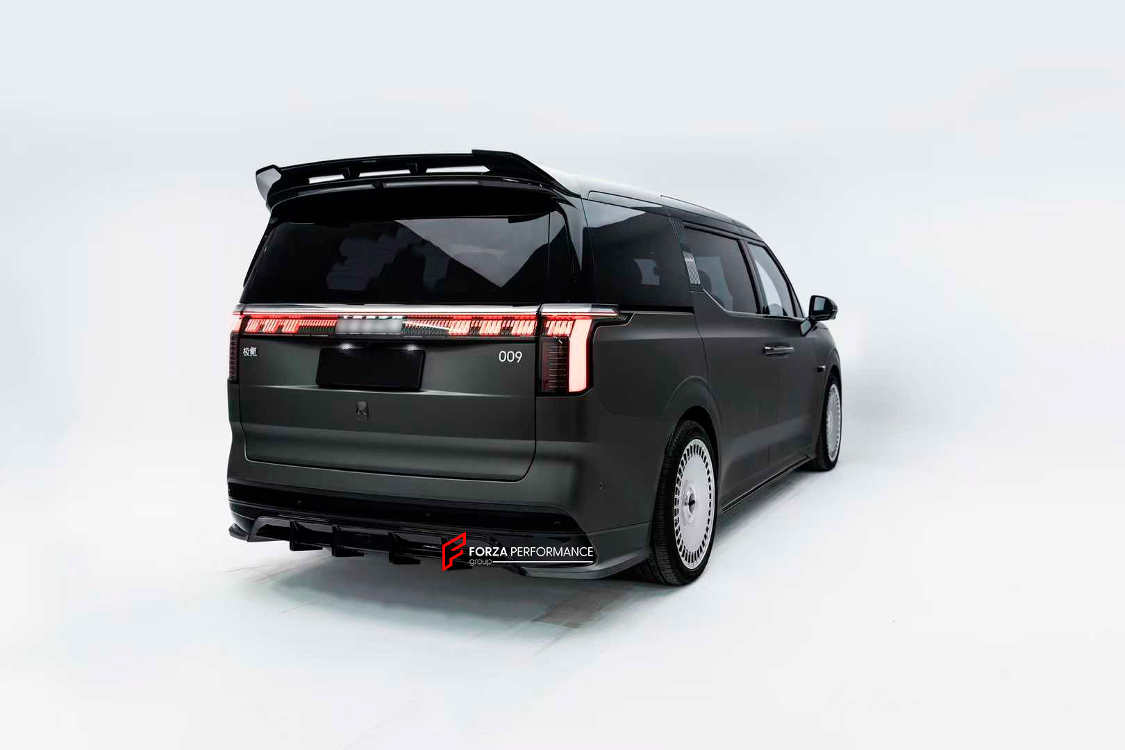 BODY KIT FOR ZEEKR 009 2022+

Set includes:
Front Lip

Side Skirt
Roof Spoiler
Rear Diffuser

Material: Plastic

NOTE: Professional installation is required