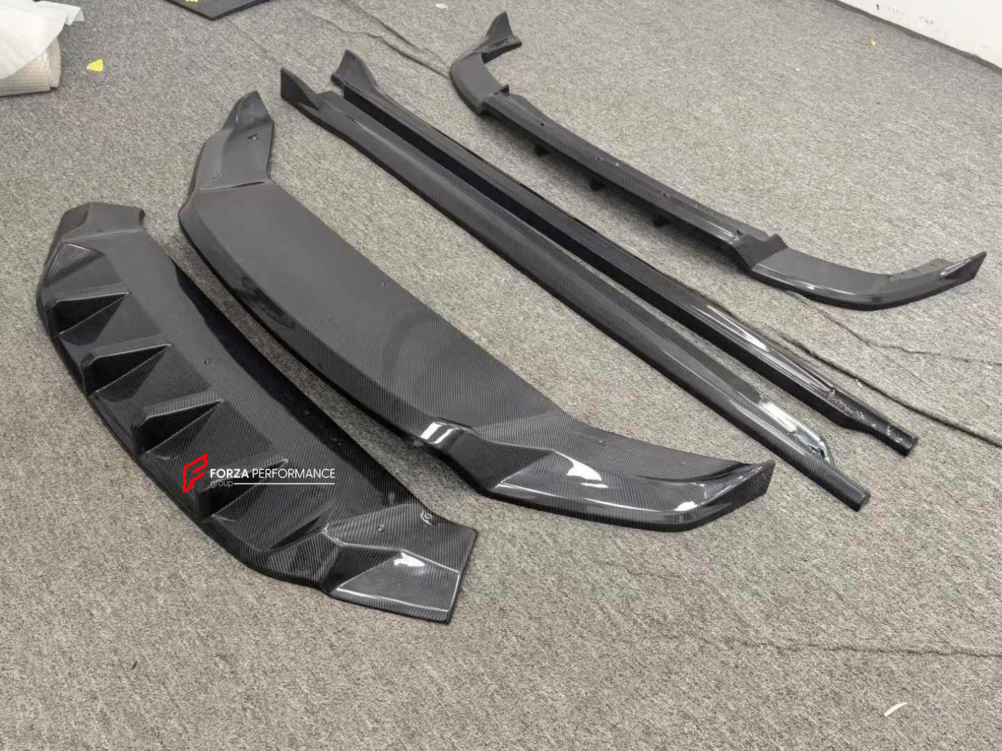 CARBON AERO KIT for MASERATI GRECALE 2022+

Set includes:
Front Lip
Side Skirt
Rear diffuser
Roof Spoiler

Material: Carbon Fiber

Note: Professional installation is required.