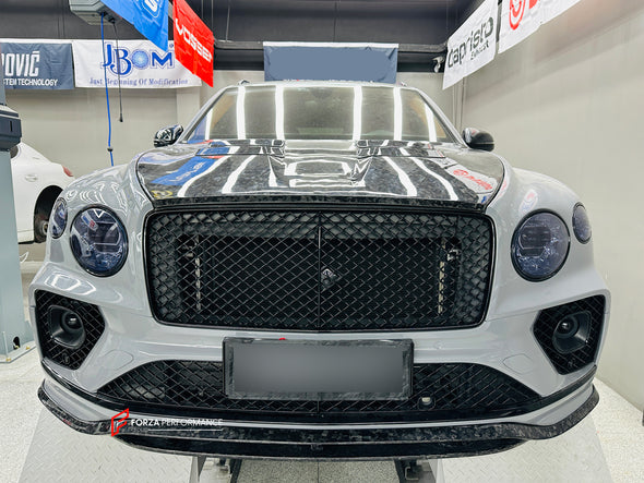 CARBON BODY KIT for BENTLEY BENTAYGA 2020+

Set includes:

Front Lip
Front Canards
Side Skirts
Rear Diffuser
Rear Spoiler
Material: Carbon

Note: Professional installation is required.

Contact us for pricing.