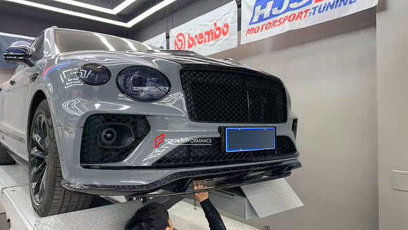 CARBON BODY KIT for BENTLEY BENTAYGA 2020+

Set includes:

Front Lip
Front Canards
Side Skirts
Rear Diffuser
Rear Spoiler
Material: Carbon

Note: Professional installation is required.

Contact us for pricing.