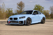 CARBON BODY KIT FOR BMW M2/M2C G87  Set includes:  Front Lip Front Vent Covers Front Canards Rear Diffuser Rear Spoiler Rear Canards Skit plate Side Skirts  Side Canards Mirror Covers